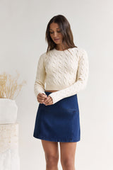 Der exklusive Zopfstrickpullover Cremeweiß